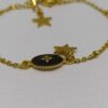 Laia : Bracelet doré avec un médaillon noir et une étoile – Image 2
