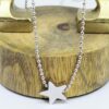 Olga: Collier sautoir argenté en acier chirurgical avec une étoile